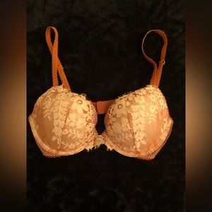 VS bra colored burnt orange and creme 34C